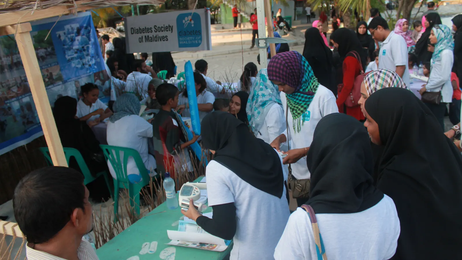 DSM staff conducting a community health screening in the Maldives